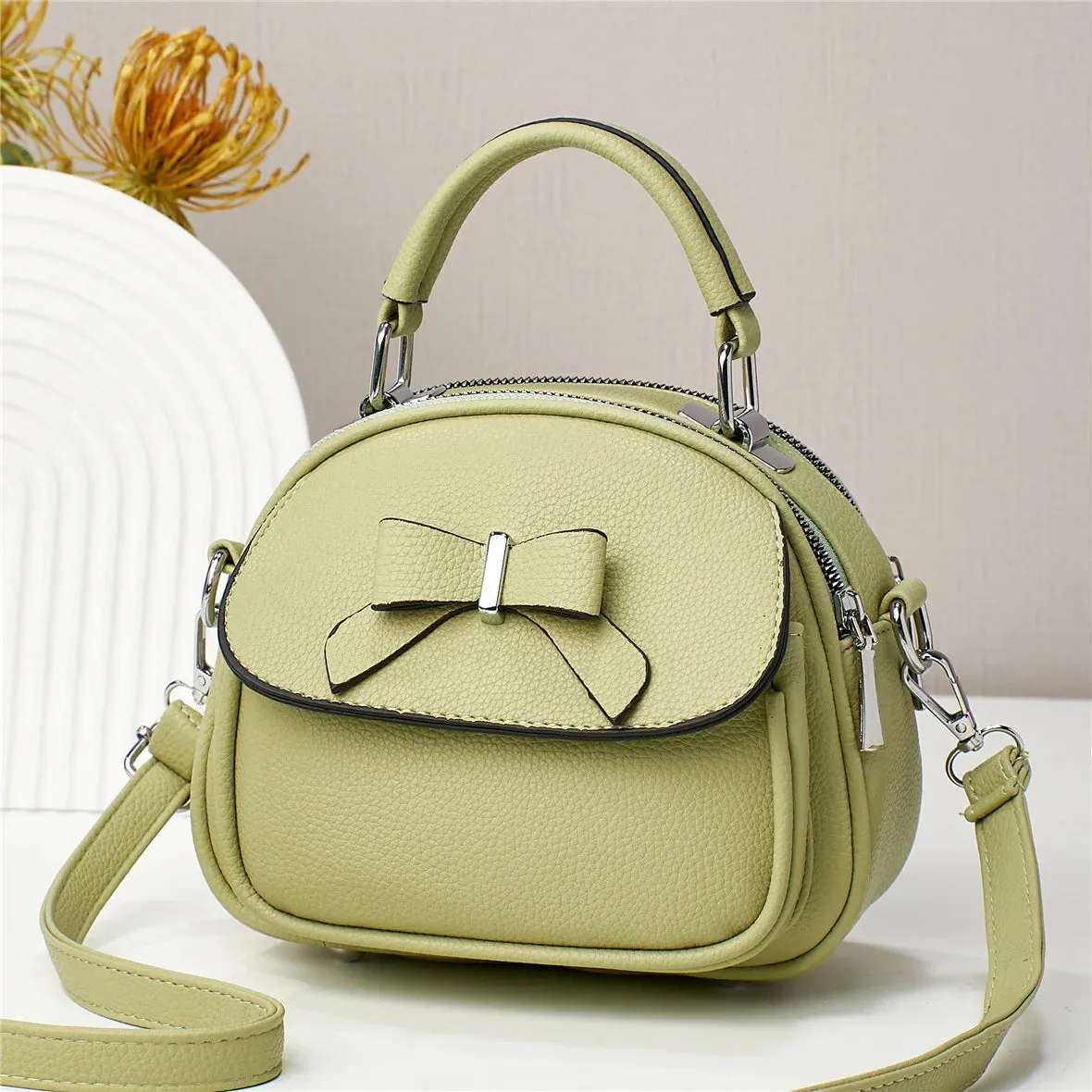Casual Cute Bowknot New Fashion Ellipse Bag Solid Color Leather Simple Single-shoulder Crossbody Bag